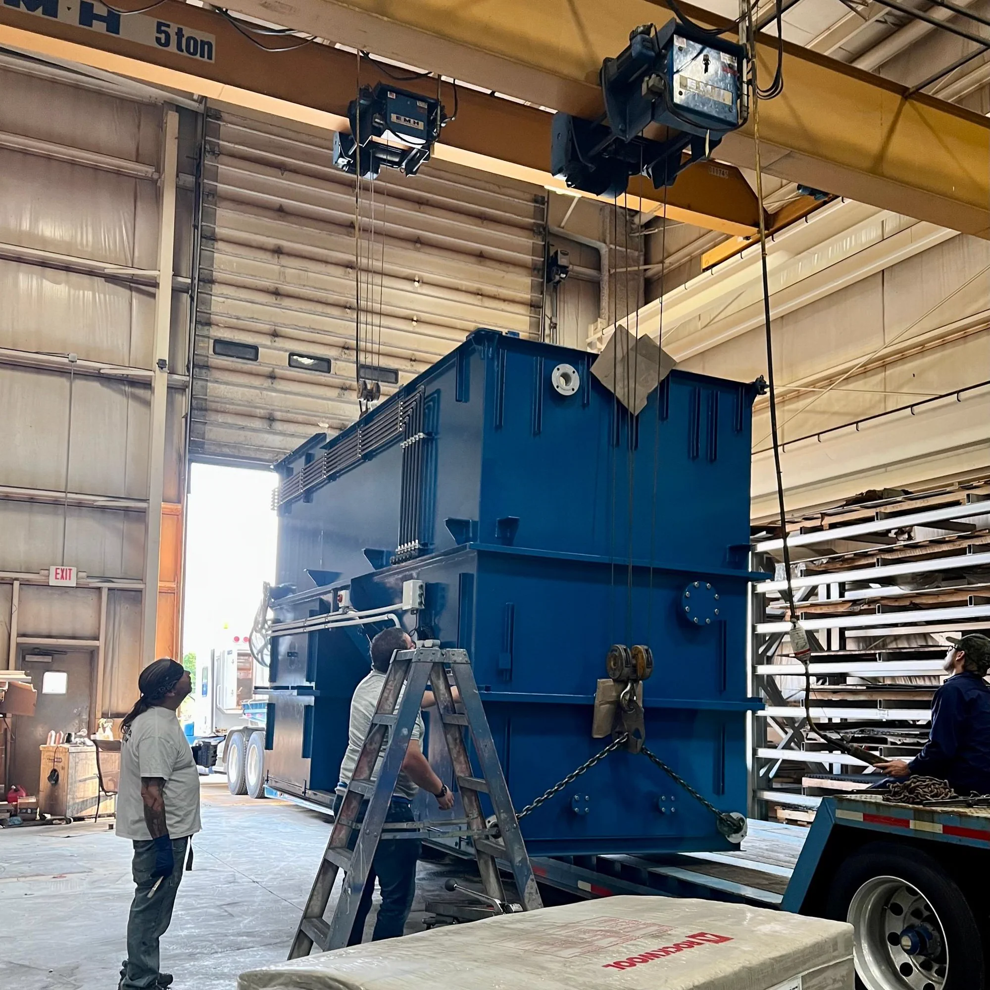 Large fabricated assembly being handled inside the Ahner shop